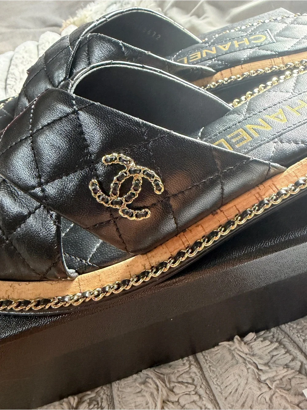 CHANEL Authentic Black Quilted Leather Mules with Gold Chain Trim